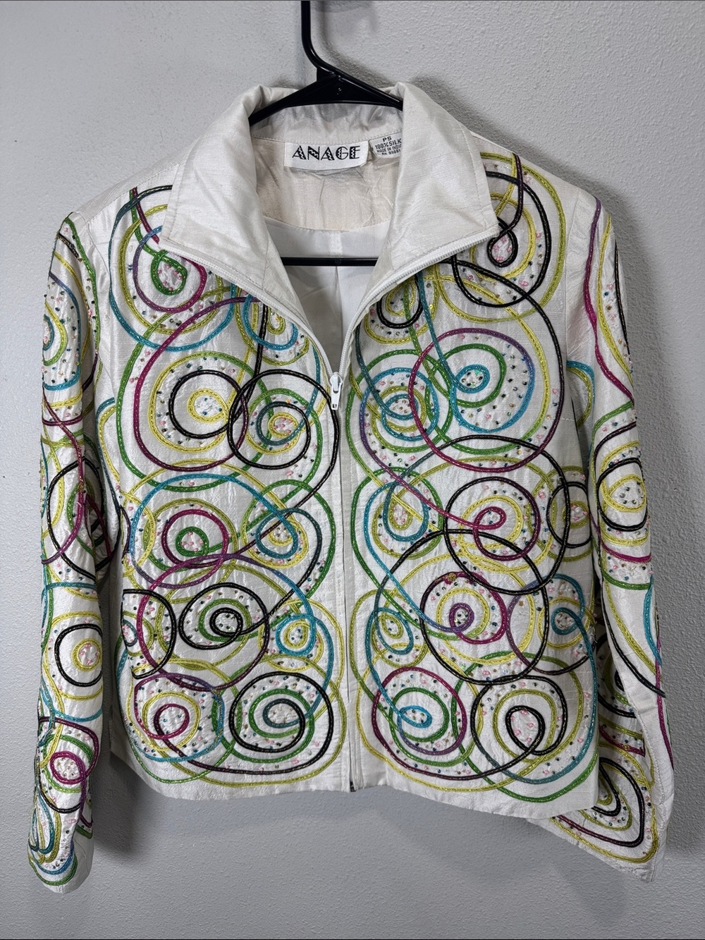 Anage White Zip-Front Jacket with Multicolor Swirl Embroidery